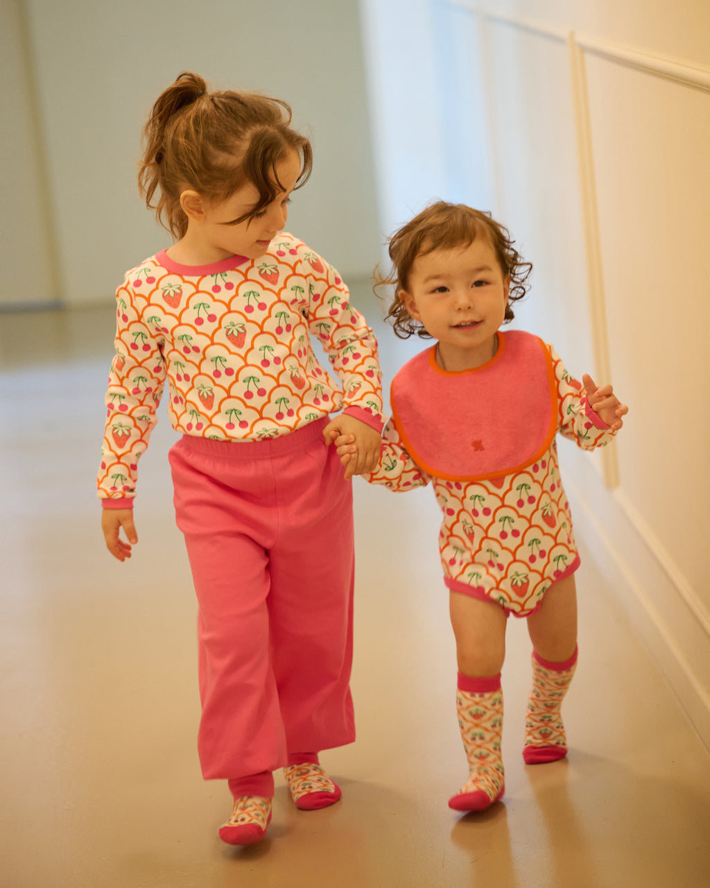 Joey Reversable Bib - Pink & Orange